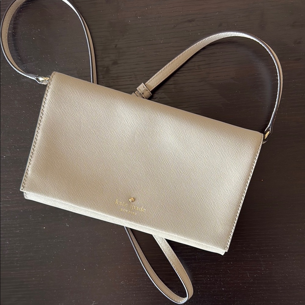 kate spade taupe crossbody bag with gold logo